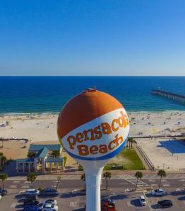 Aerial image of the water tower at Pensacola Beach, painted to look like a beach ball.